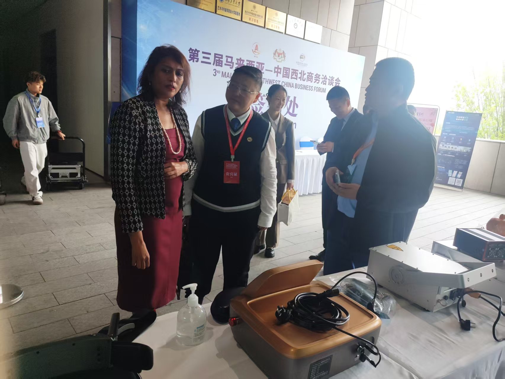 Malaysian Consul General Farah Rakesh visiting the NJ Laser Tech booth at the 3rd Malaysia–Northwest China Business Forum Malaysian Consul General Farah Rakesh visiting the NJ Laser Tech booth at the 3rd Malaysia–Northwest China Business Forum