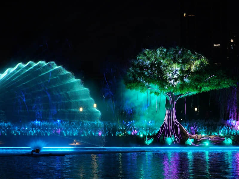 Xianyang Gudu Covered Bridge nighttime laser show featuring waterfront lighting, colorful laser beams and water effects