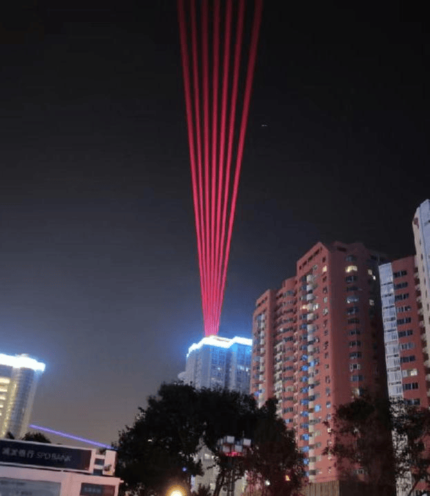 Xi'an Coffee Street architectural laser show featuring 50 high-power RGB laser systems and colorful city skyline effects