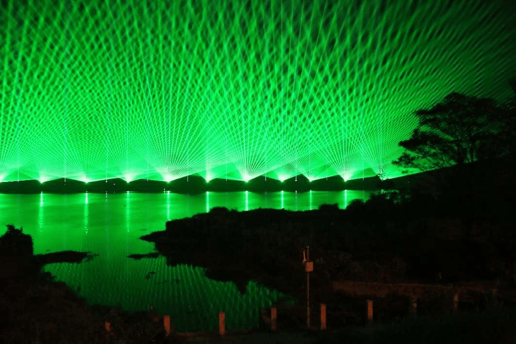 Fuhe River riverside laser show featuring 21 high-power 20W green laser systems Fuhe River riverside laser show featuring 21 high-power 20W green laser systems