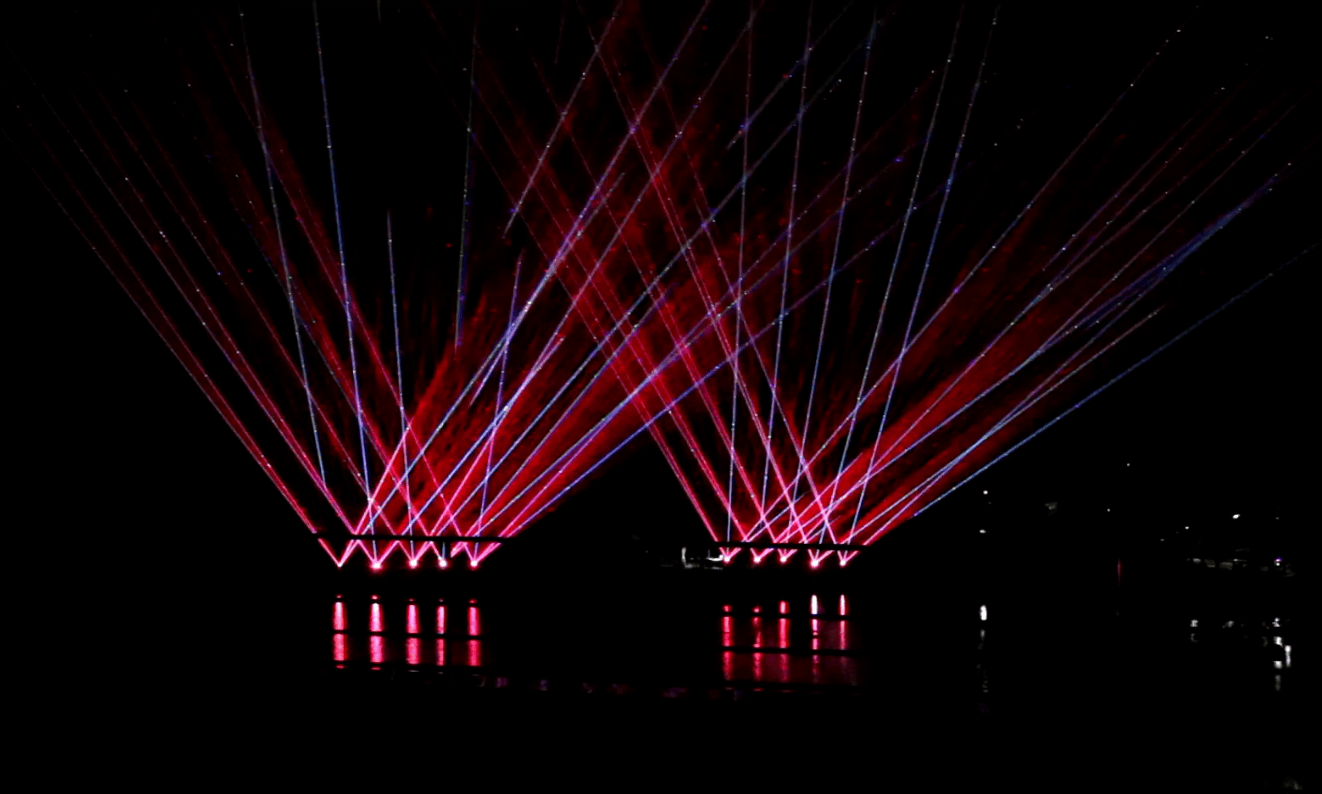 Xi'an Gaoke Hotel laser show featuring ten 60W RGB laser systems and waterfront lighting effects Xi'an Gaoke Hotel laser show featuring ten 60W RGB laser systems and waterfront lighting effects