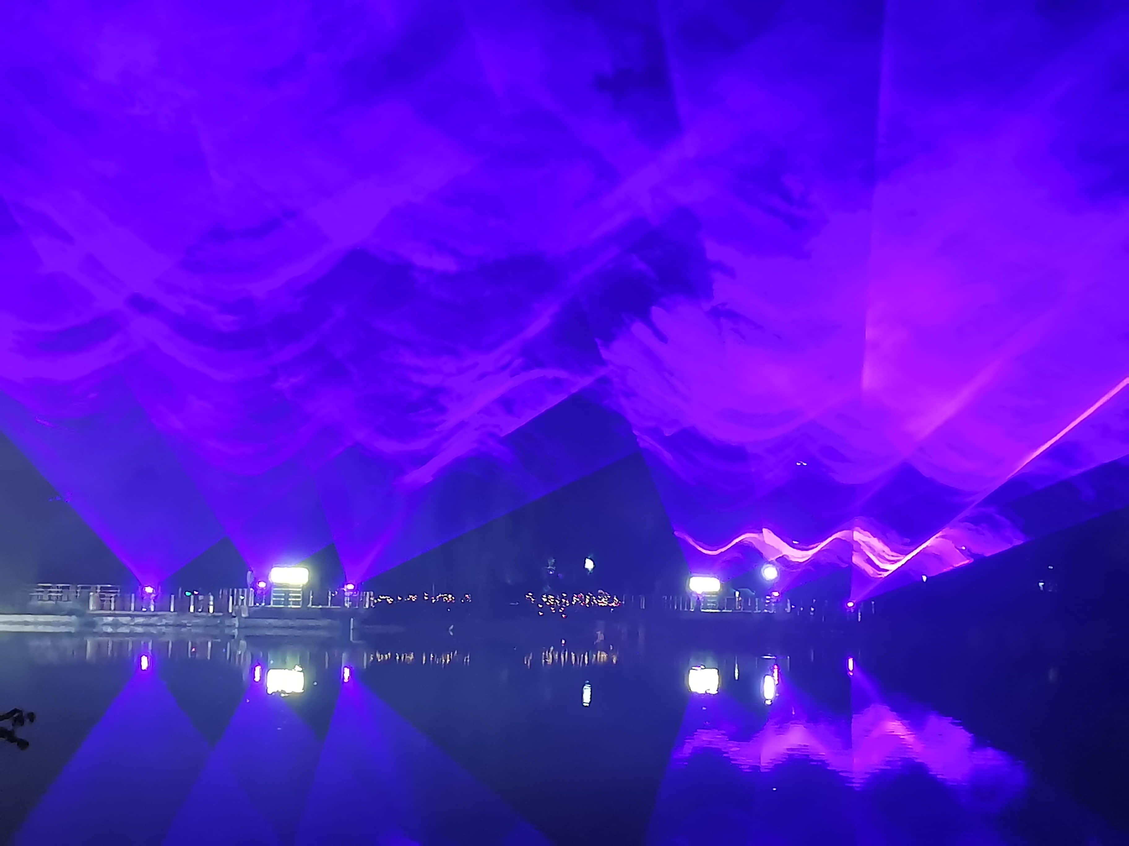 Xi'an Gaoke Hotel laser show featuring ten 60W RGB laser systems and waterfront lighting effects Xi'an Gaoke Hotel laser show featuring ten 60W RGB laser systems and waterfront lighting effects