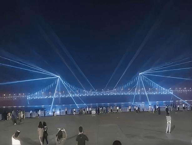 Dalian Xinghai Bay Bridge nightscape lighting project featuring two 60W RGB laser show systems