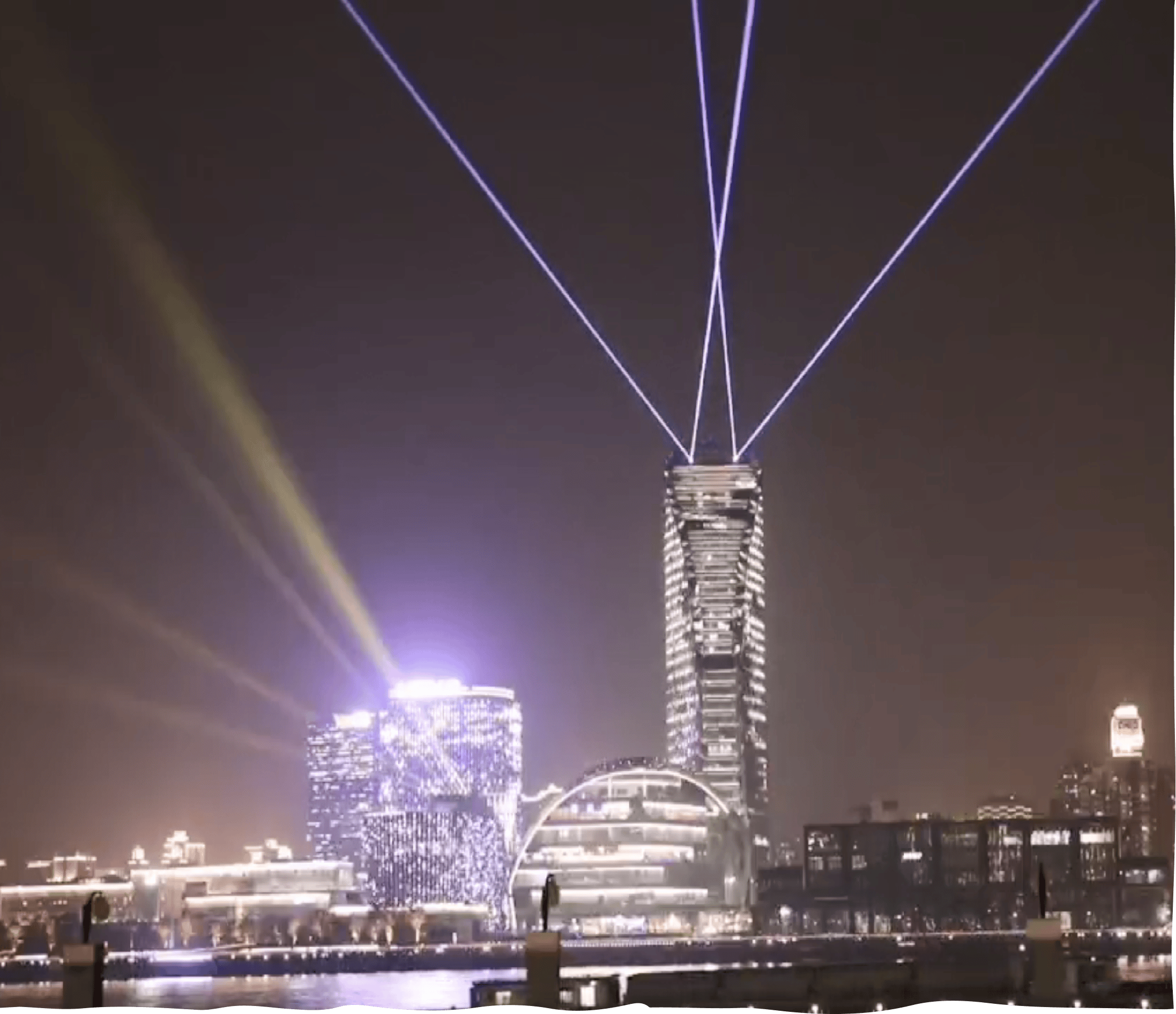 Shanghai Huangpu River waterfront lighting project featuring high-power RGB laser beams and architectural illumination Shanghai Huangpu River waterfront lighting project featuring high-power RGB laser beams and architectural illumination