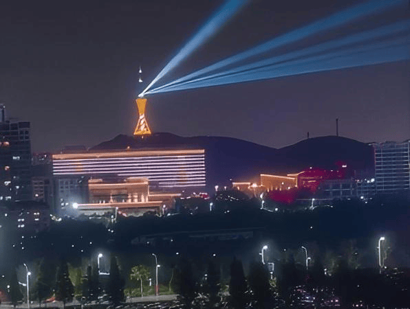 Qingdao urban landmark laser show featuring three 60W RGB laser systems and outdoor architectural lighting