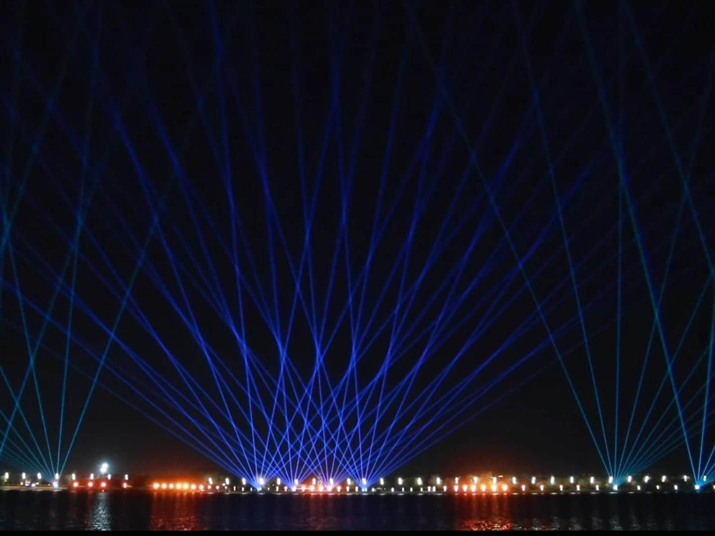 Outdoor laser lighting display at Harbin Flood Control Memorial Tower near the Songhua River in Heilongjiang, China Outdoor laser lighting display at Harbin Flood Control Memorial Tower near the Songhua River in Heilongjiang, China