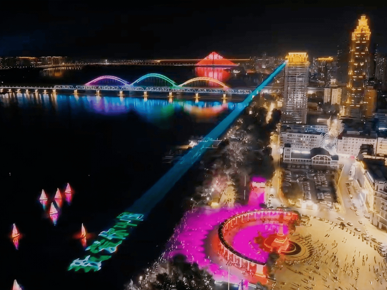 Outdoor laser lighting display at Harbin Flood Control Memorial Tower near the Songhua River in Heilongjiang, China Outdoor laser lighting display at Harbin Flood Control Memorial Tower near the Songhua River in Heilongjiang, China