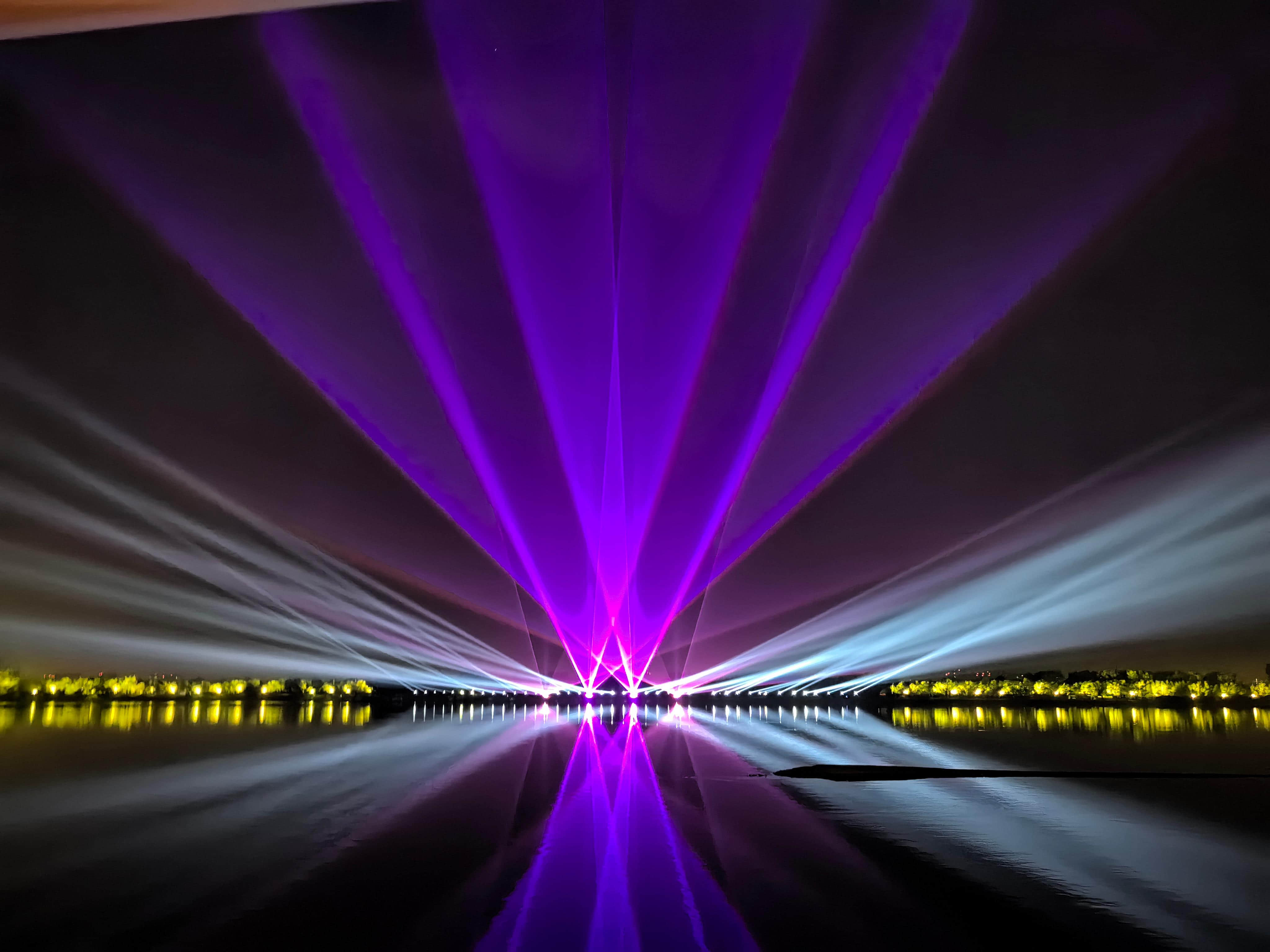 Outdoor laser lighting display at Harbin Flood Control Memorial Tower near the Songhua River in Heilongjiang, China Outdoor laser lighting display at Harbin Flood Control Memorial Tower near the Songhua River in Heilongjiang, China